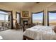 Spacious main bedroom with fireplace and access to balcony at 4479 Tierra Alta Dr, Castle Rock, CO 80104