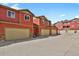 Townhome exterior with multiple car garages at 1775 Aspen Meadows Cir, Denver, CO 80260