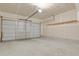 Spacious two car garage with ample room for parking and storage at 1775 Aspen Meadows Cir, Denver, CO 80260