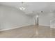 Bright, open living room with hardwood floors and neutral paint, great natural light at 1775 Aspen Meadows Cir, Denver, CO 80260