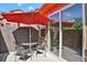 Cozy outdoor patio with table and chairs, perfect for relaxing or entertaining at 1775 Aspen Meadows Cir, Denver, CO 80260