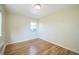 Inviting bedroom with hardwood flooring, natural light, and a cozy atmosphere at 2100 N Franklin St # 8, Denver, CO 80205