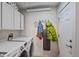 Convenient laundry room with LG washer/dryer, ample storage, and functional layout at 3835 N Raleigh St, Denver, CO 80212