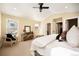 Bright bedroom with vaulted ceilings, neutral decor, and an abundance of natural light at 25728 Stanley Park Rd, Evergreen, CO 80439