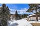 Breathtaking mountain views with a charming cabin in a winter wonderland at 25728 Stanley Park Rd, Evergreen, CO 80439