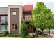 Modern townhome boasts balconies and lush landscaping at 2110 W 67Th Pl, Denver, CO 80221