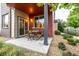 Cozy outdoor patio with a dining table and chairs, perfect for entertaining at 2110 W 67Th Pl, Denver, CO 80221