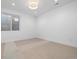 Bright and airy basement bedroom with neutral decor at 410 S Vine St, Denver, CO 80209