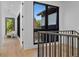 Bright hallway with hardwood floors and large windows at 410 S Vine St, Denver, CO 80209