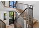 Modern staircase with metal railing and light wood steps at 410 S Vine St, Denver, CO 80209