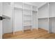 Spacious walk-in closet with ample shelving and hanging space at 410 S Vine St, Denver, CO 80209