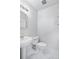 Clean half-bathroom with a pedestal sink, and a marble-patterned floor at 2020 Arapahoe St # 1130, Denver, CO 80205