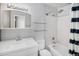 Bathroom with a bright white sink, shower and toilet at 2020 Arapahoe St # 1130, Denver, CO 80205