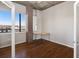 Bedroom featuring hardwood floors, natural light and an open space at 2020 Arapahoe St # 1130, Denver, CO 80205