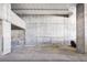 Underground parking garage with gray concrete walls and yellow painted parking lines at 2020 Arapahoe St # 1130, Denver, CO 80205