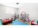 Playful ' room with toys and a large play area at 4191 S Eliot St, Englewood, CO 80110