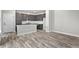 Modern kitchen with stainless steel appliances, white countertops and a center island at 8894 Yellowcress St, Littleton, CO 80125