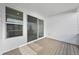 Outdoor patio with a wooden deck, a covered roof, and sliding glass doors at 8894 Yellowcress St, Littleton, CO 80125