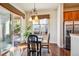 Dining area with access to the outside patio for dining and relaxation at 13901 E Saratoga Pl, Aurora, CO 80015