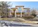 Stunning two-story home with balconies and stucco exterior, offering curb appeal at 13901 E Saratoga Pl, Aurora, CO 80015