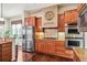 The kitchen has stainless steel appliances, cabinetry, and countertop at 13901 E Saratoga Pl, Aurora, CO 80015