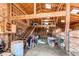 Spacious barn interior with wooden beams, staircase, skylights, and ample storage space, ideal for various uses at 42919 Vista Rdg, Parker, CO 80138