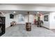 Finished basement features a barrel table, saddle display, and other decor at 42919 Vista Rdg, Parker, CO 80138