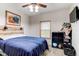 Comfortable bedroom with cozy bedding, natural light, and decorative accents, creating a peaceful retreat at 42919 Vista Rdg, Parker, CO 80138