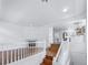 Open-concept living area featuring hardwood floors and a fireplace at 1491 Ophir Rd, Castle Rock, CO 80109