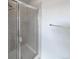 Modern bathroom featuring a glass-enclosed shower with tiled walls and sleek fixtures at 1491 Ophir Rd, Castle Rock, CO 80109