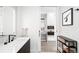 A spa-like bathroom with modern fixtures, including a sleek sink and vanity, promises relaxation at 1901 Wazee St # 304, Denver, CO 80202
