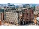Modern building showcasing urban living with mountain views in the background at 1901 Wazee St # 304, Denver, CO 80202