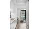 Bright modern kitchen with stainless steel appliances opening into the living area at 1901 Wazee St # 304, Denver, CO 80202