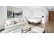 Living room showcases a sofa, round table, murphy bed, and modern design at 1901 Wazee St # 304, Denver, CO 80202
