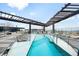 Relaxing rooftop pool featuring lounge chairs and city views at 1901 Wazee St # 304, Denver, CO 80202