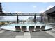 Relaxing rooftop pool featuring lounge chairs and a stunning city view at 1901 Wazee St # 304, Denver, CO 80202