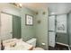 Charming bathroom featuring a vanity, toilet, decor, and a convenient stacked washer and dryer at 20445 Mitchell Pl, Denver, CO 80249