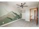 Bedroom featuring plush carpeting, a mountain mural and closet at 20445 Mitchell Pl, Denver, CO 80249