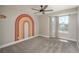 Bedroom featuring plush carpeting, a rainbow mural, and a window at 20445 Mitchell Pl, Denver, CO 80249