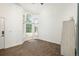 Bright living room with vaulted ceilings, hardwood floors, and large windows allowing ample natural light at 20445 Mitchell Pl, Denver, CO 80249