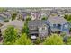 Scenic aerial view of a gray home with a backyard patio in a suburban neighborhood at 1867 W 137Th Ln, Broomfield, CO 80023