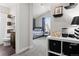 Bedroom featuring ensuite bath, vaulted ceiling and white shelving unit at 1867 W 137Th Ln, Broomfield, CO 80023