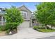 Charming two-story home with gray siding, well-manicured landscaping, and an attached two-car garage at 1867 W 137Th Ln, Broomfield, CO 80023