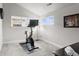 Bright home gym with exercise bike, neutral colors, and ample natural light at 1867 W 137Th Ln, Broomfield, CO 80023