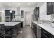 Bright kitchen with granite countertops, stainless steel appliances, and a stylish backsplash, combining form and function at 1867 W 137Th Ln, Broomfield, CO 80023