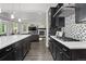 Well-appointed kitchen overlooking a comfortable living space, perfect for modern living and entertaining guests at 1867 W 137Th Ln, Broomfield, CO 80023