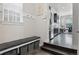 Practical mudroom with a bench, storage baskets, and easy access to the kitchen at 1867 W 137Th Ln, Broomfield, CO 80023
