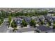 A street view of well-maintained homes with trees lining the street, and solar panels displayed on one home at 1867 W 137Th Ln, Broomfield, CO 80023