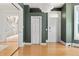 Entryway with hardwood floors, closet, and view to a secondary room at 2098 N Clarkson St, Denver, CO 80205