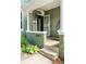 Welcoming front porch and entry to the home, with attractive details at 2098 N Clarkson St, Denver, CO 80205